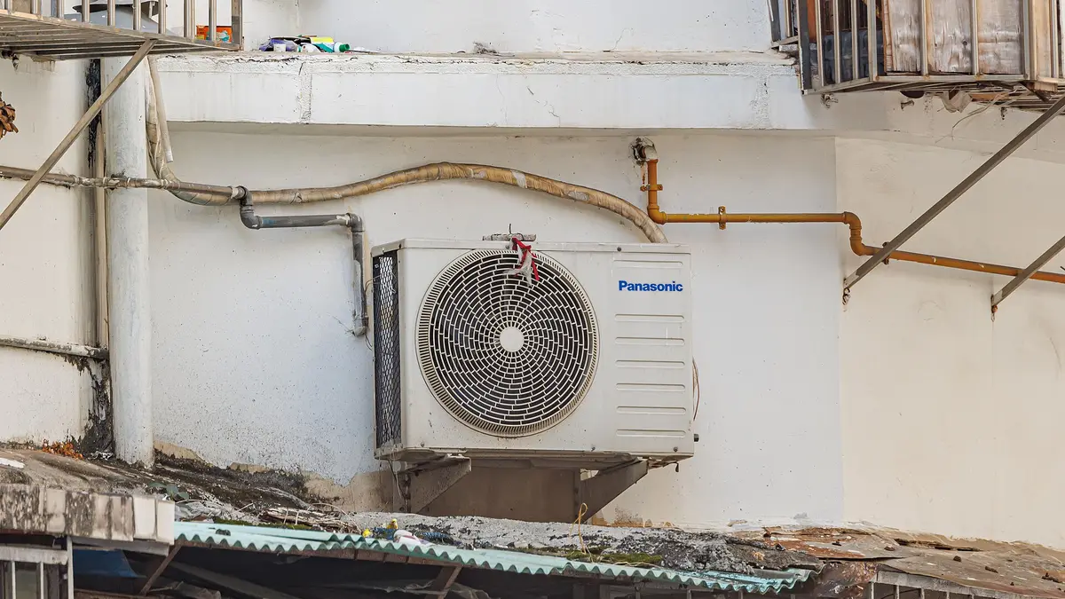 Outdoor unit of a split air conditioner mounted on a wall