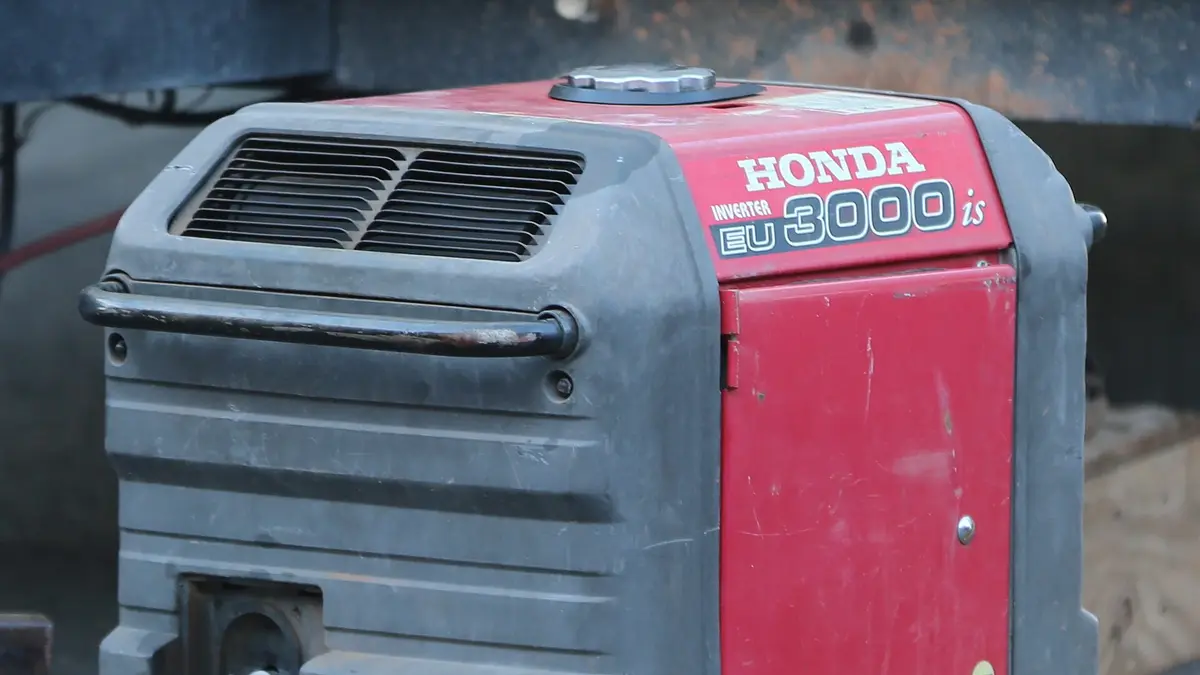 Red Honda EU3000is portable inverter generator
