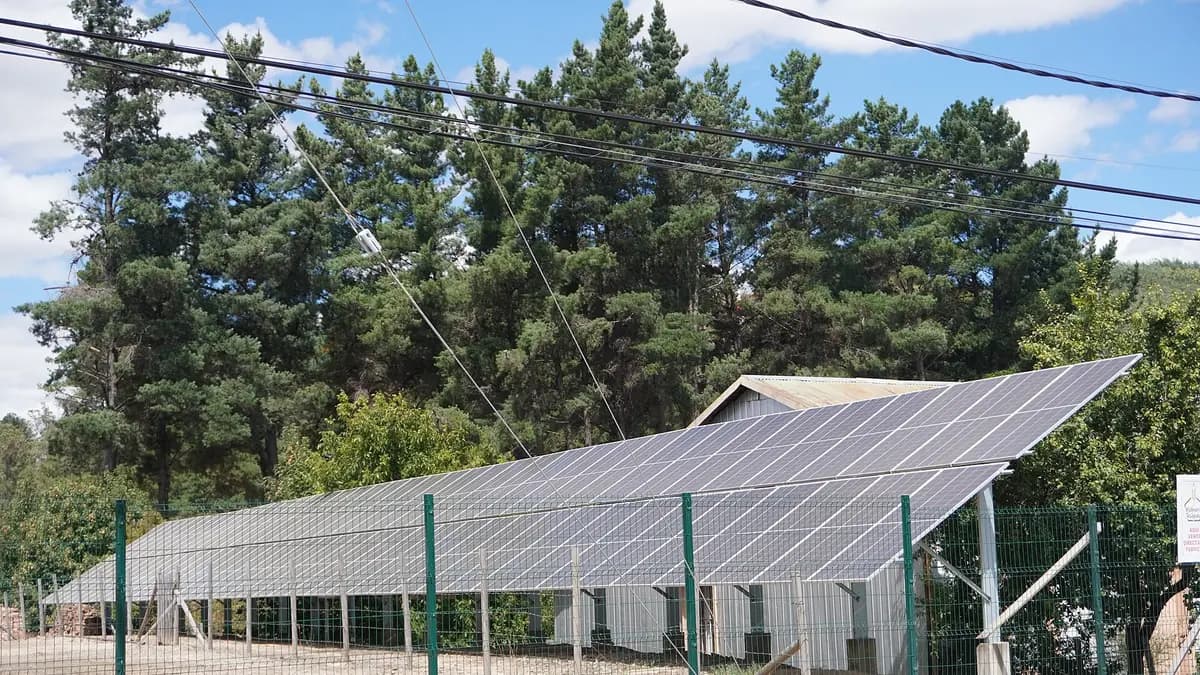 Solar panels installed next to a flour mill in Traiguén, in Chile’s La Araucanía Region
