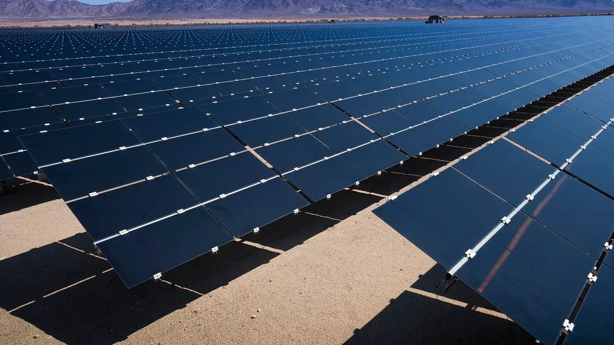 Rows of solar panels at a photovoltaic plant in the desert