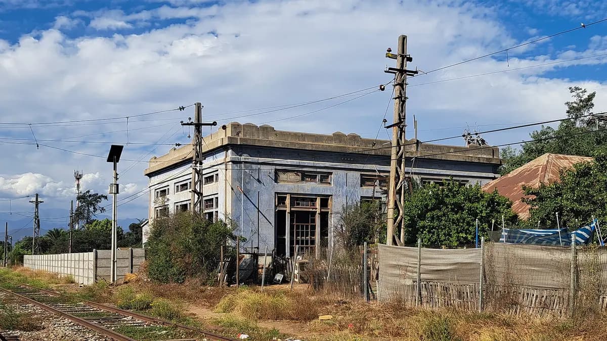 Old electrical substation next to a railway in Quillota, Chile